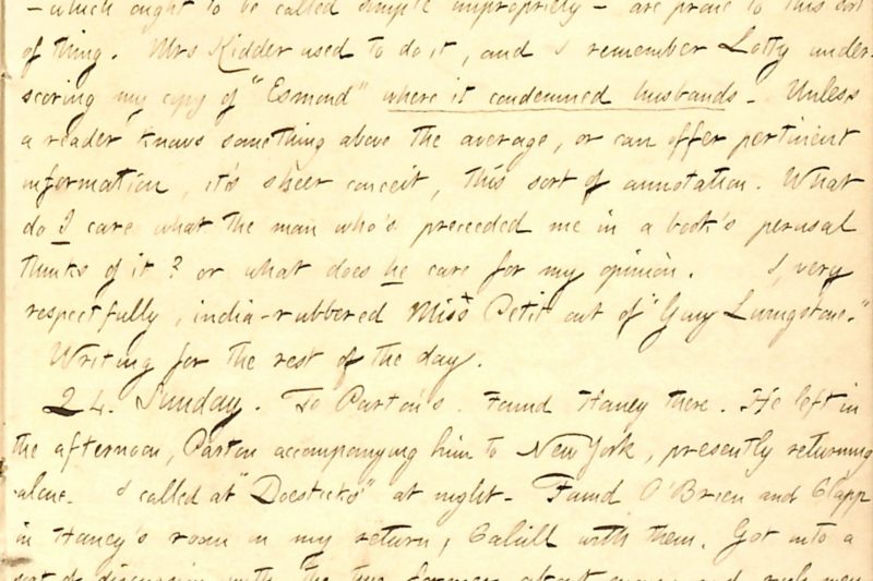 An open hardback novel face down on a wooden desk with annotated pages visible, a sharpened pencil and a small notebook with handwritten observations about sentence structure beside it.