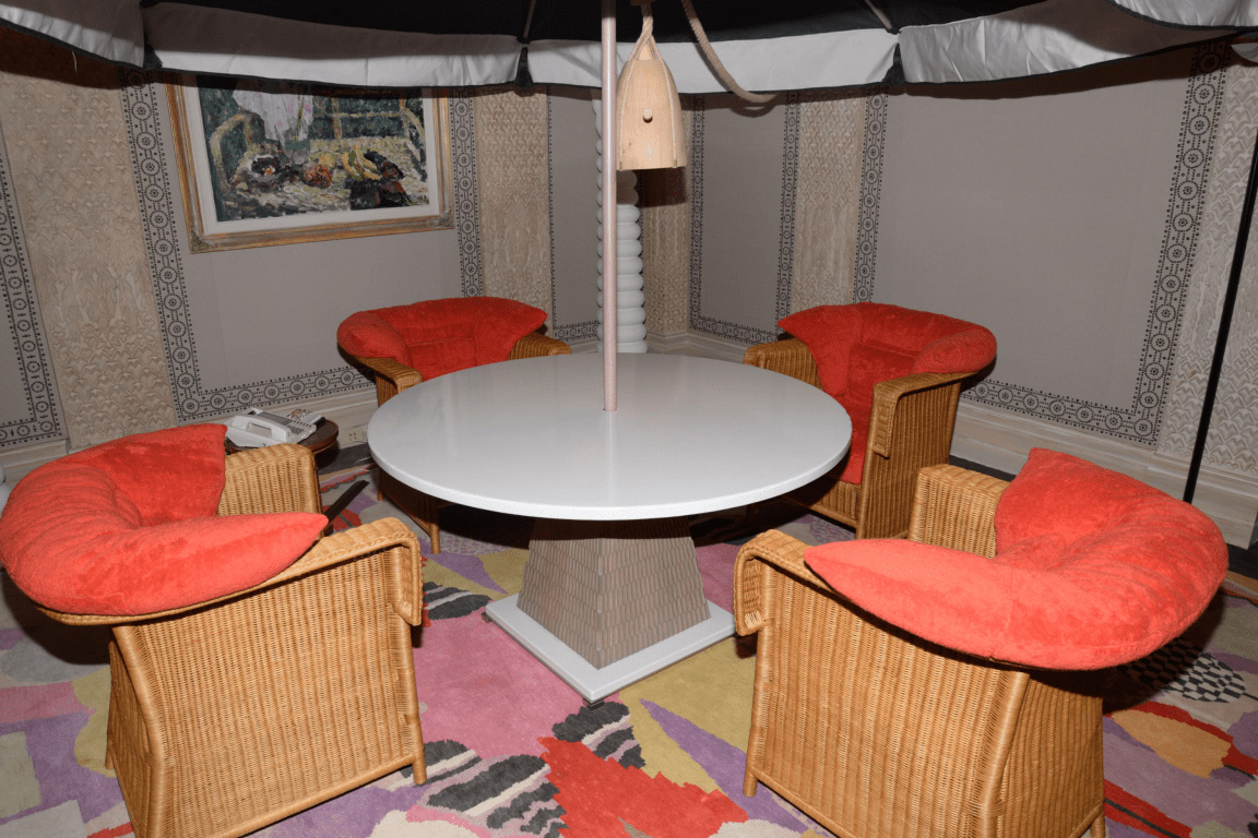 wooden chairs around table